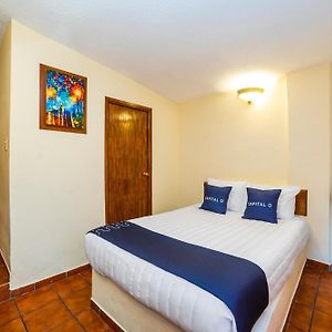 Capital O Hotel Casa Blanca